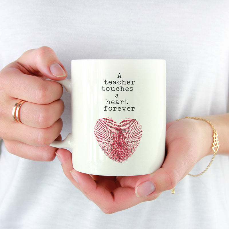 teacher touches a heart forever mug